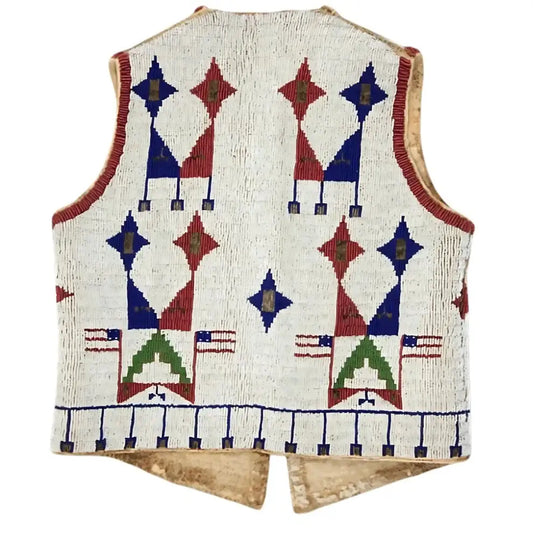 Handcrafted suede leather vest with geometric beadwork in blue, red, and green.