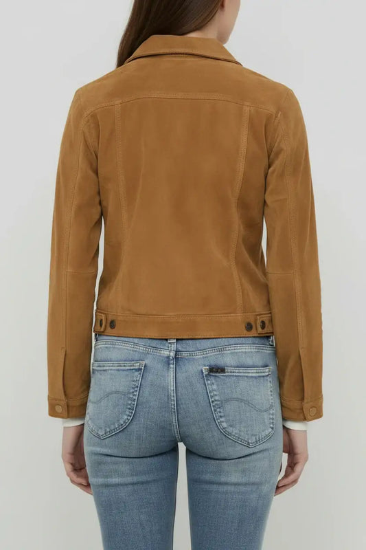 Back view of a women's tan suede western jacket by Zhim Leather Creations paired with blue jeans.