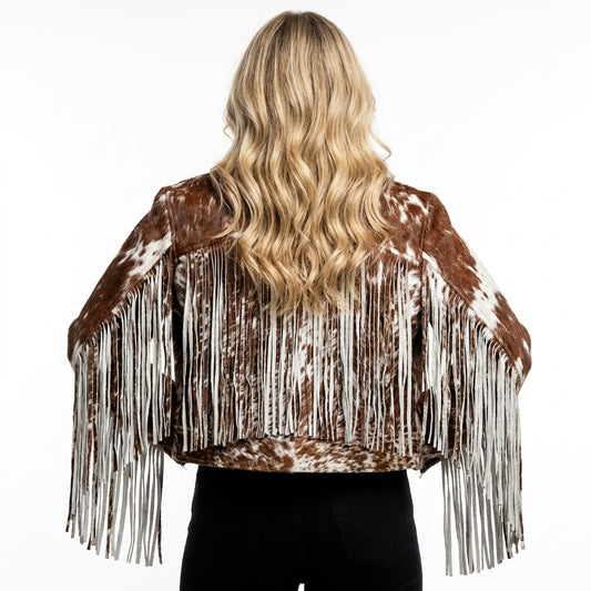 Cowhide leather jacket with fringes on a white background