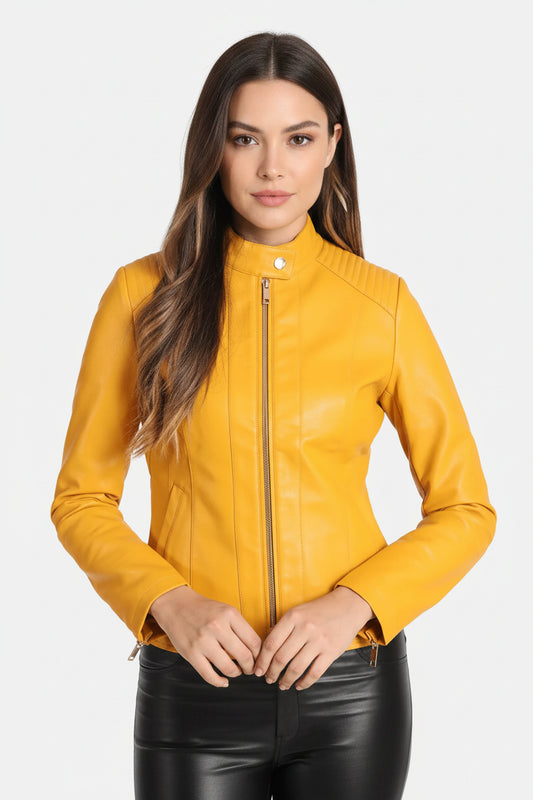 A woman wearing a yellow real leather jacket with a mandarin collar and zipper details, paired with black leather pants.