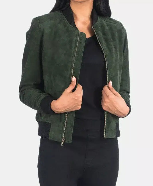 Woman wearing a Zhim Leather Creations dark green handcrafted suede bomber jacket.