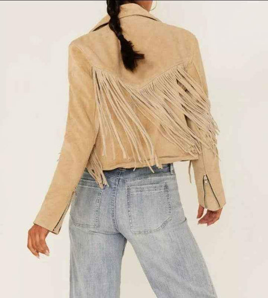 Women's tan suede fringe cowboy jacket by Zhim Leather Creations worn with blue jeans.