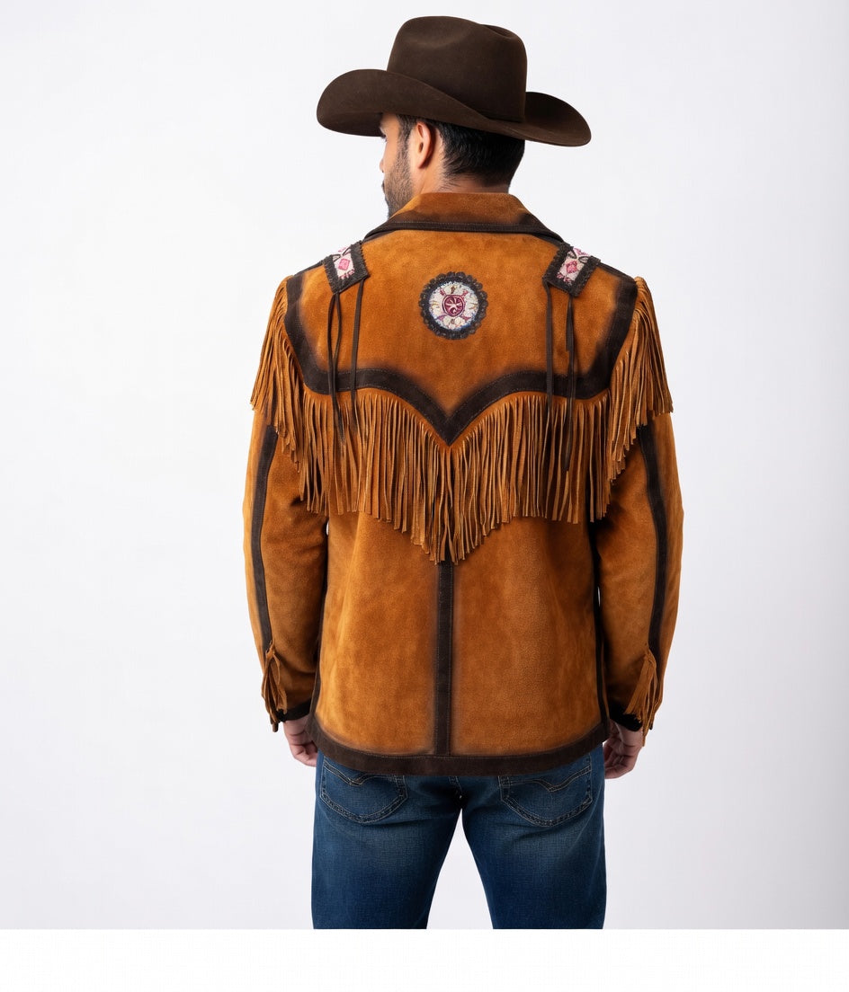 Man wearing a brown suede cowboy jacket with fringes and a hat on a white background