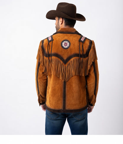 Man wearing a brown suede cowboy jacket with fringes and a hat on a white background