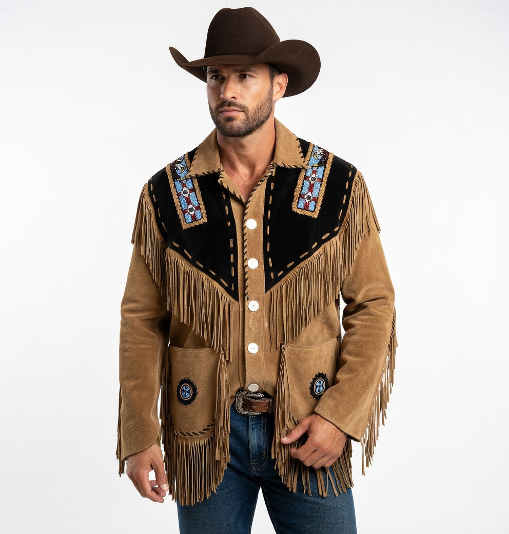 Man wearing a traditional cowboy jacket with fringes and a hat on a white background