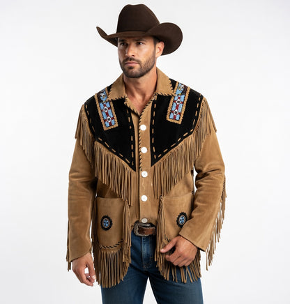 Man wearing a traditional cowboy jacket with fringes and a hat on a white background