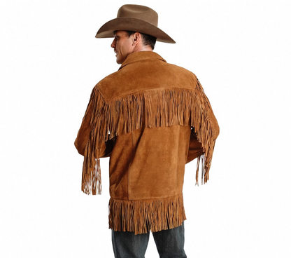 Man wearing a brown suede fringe jacket and cowboy hat on a white background