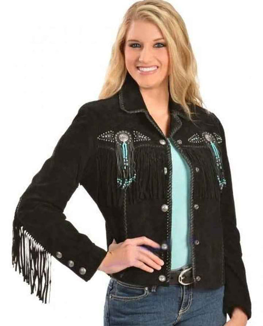 Woman wearing a black fringed jacket with decorative elements on a white background