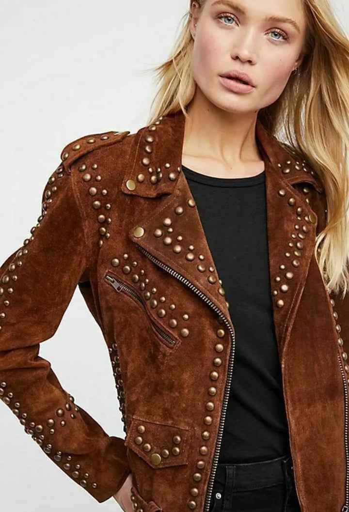 Woman wearing a brown suede jacket with studs on a white background