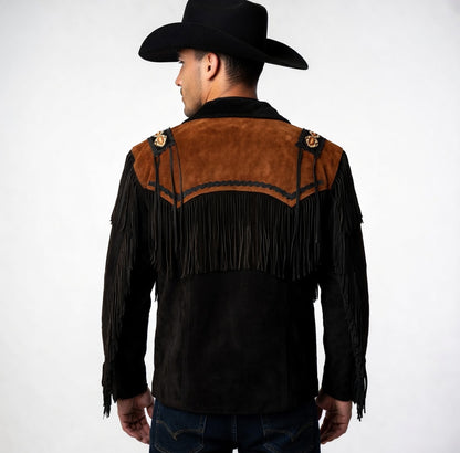 Man wearing a black and brown fringed leather jacket with a cowboy hat on a white background